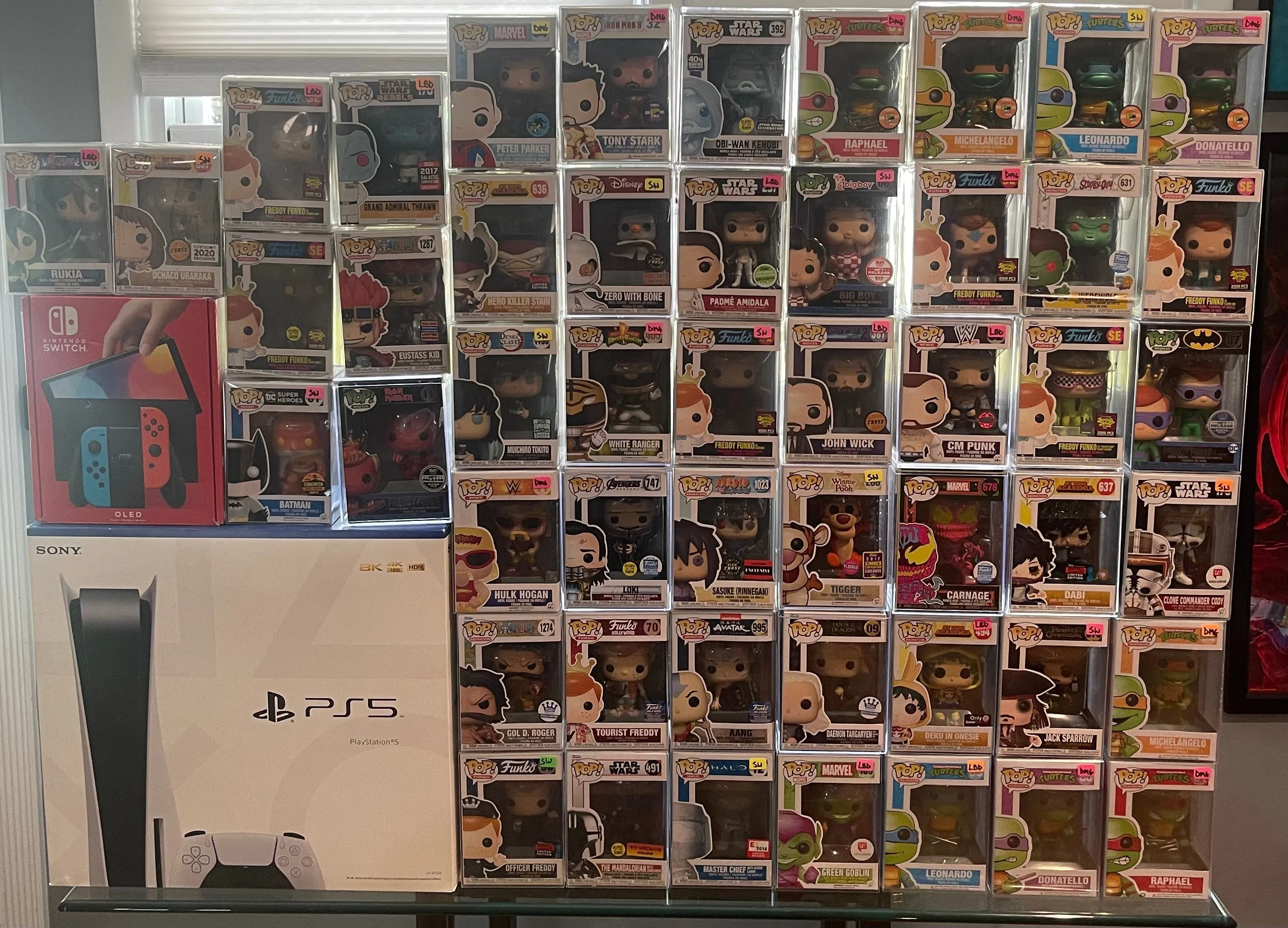 $15 Funko Pop Golden Ticket Mystery Box with over $10,000 in prizes including Grails, Playstation 5, and Nintendo Switch OLED Undiscovered Realm